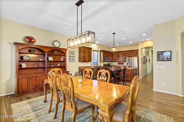 dining area featuring dark hardwood / wood-style flooring