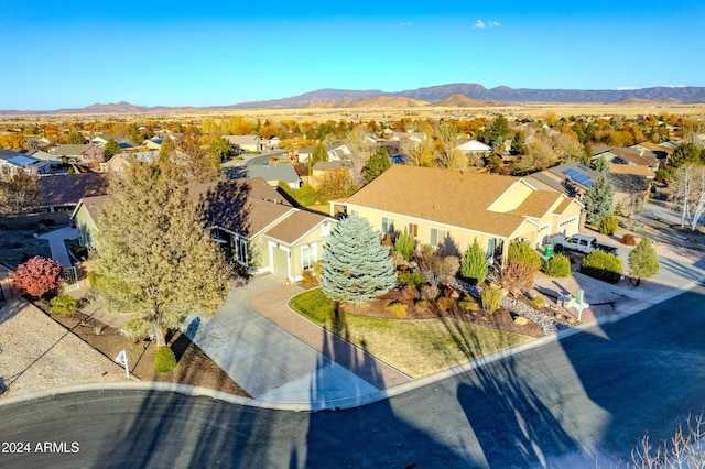 drone / aerial view featuring a mountain view