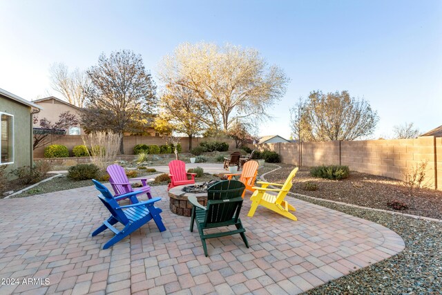 view of patio featuring a fire pit