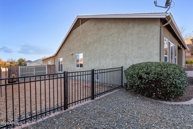 7554 E Circle Wagons Way, Prescott Valley, AZ 86315 - view of property exterior featuring a fenced backyard and stucco siding