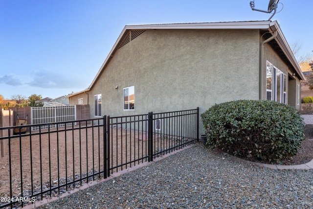 7554 E Circle Wagons Way, Prescott Valley, AZ 86315 - view of property exterior featuring a fenced backyard and stucco siding