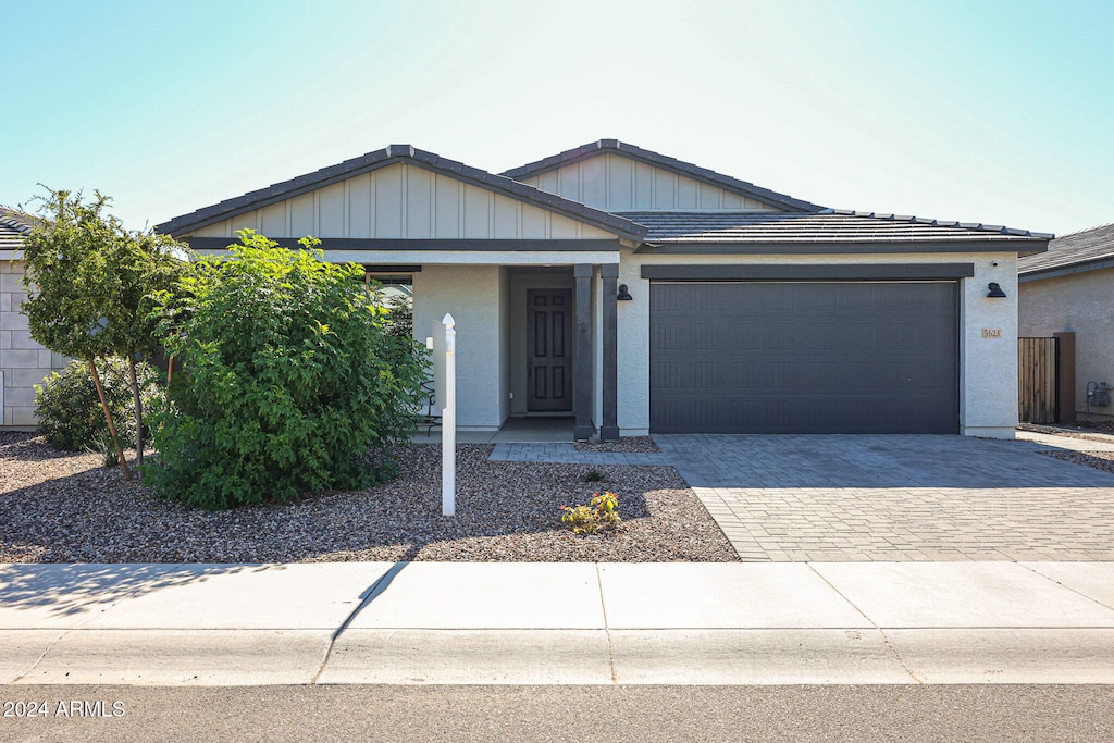 view of front of property with a garage