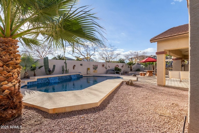 view of pool featuring a patio