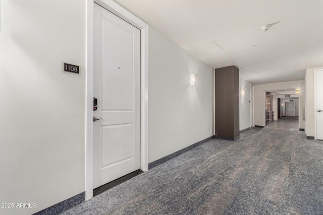 1 E Lexington Ave Unit 1108, Phoenix, AZ 85012 - hallway featuring carpet floors and baseboards