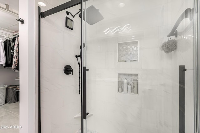 1 E Lexington Ave Unit 1108, Phoenix, AZ 85012 - full bathroom featuring a shower stall and a walk in closet