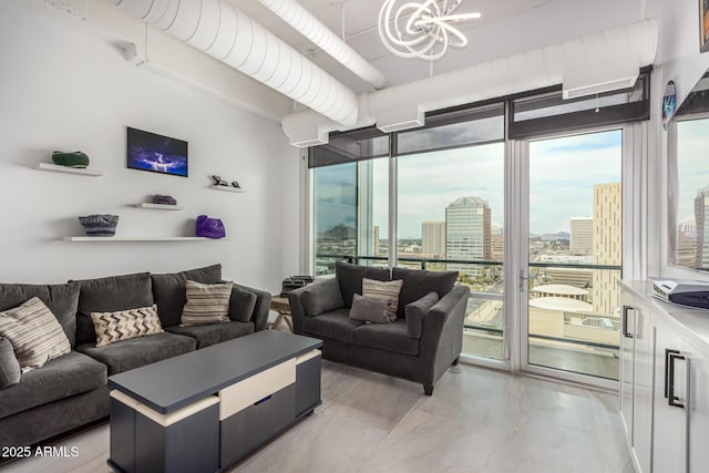 1 E Lexington Ave Unit 1108, Phoenix, AZ 85012 - living area featuring a view of city, a chandelier, and expansive windows