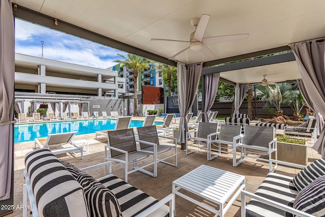 1 E Lexington Ave Unit 1108, Phoenix, AZ 85012 - view of patio featuring a ceiling fan and a community pool