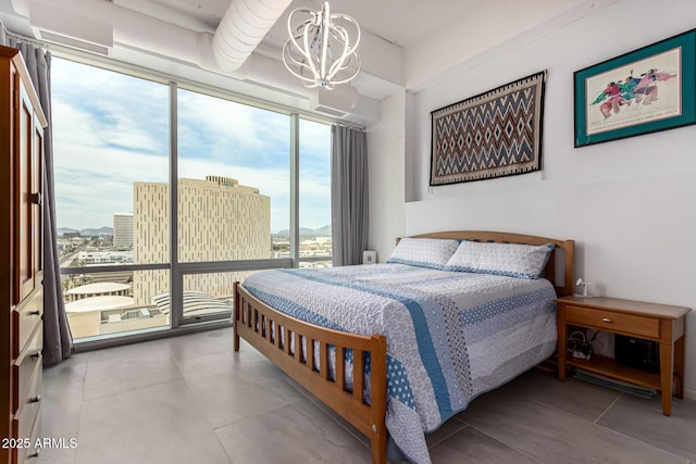 1 E Lexington Ave Unit 1108, Phoenix, AZ 85012 - bedroom with a chandelier and access to exterior