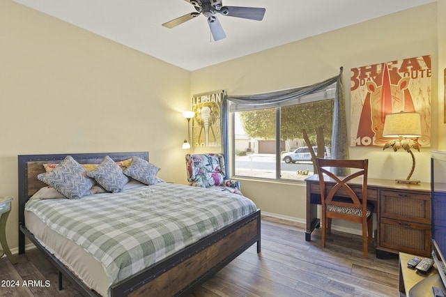 bedroom featuring ceiling fan and hardwood / wood-style floors