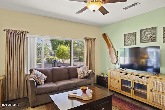 living room with ceiling fan and hardwood / wood-style flooring