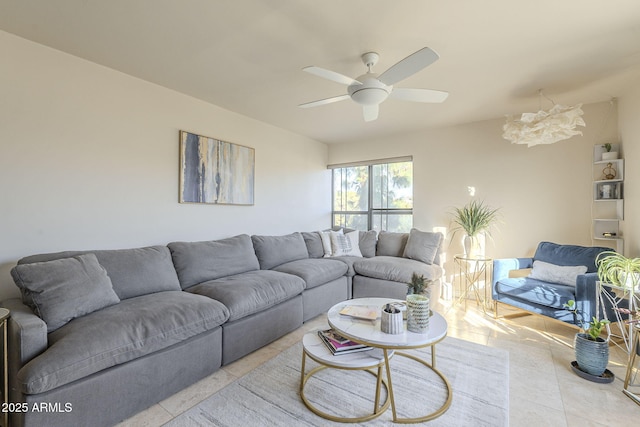 living room with ceiling fan and light tile patterned flooring