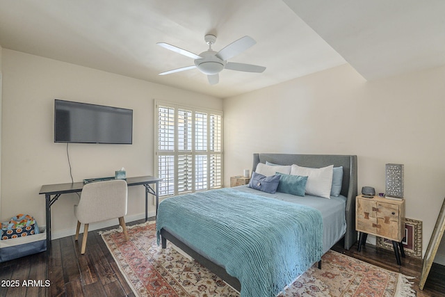 bedroom with ceiling fan and wood-type flooring