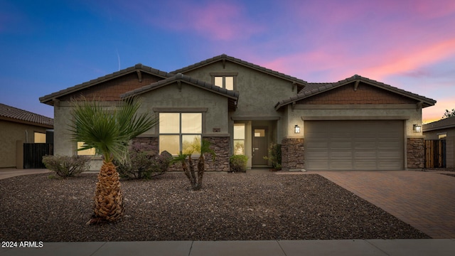 view of front of property featuring a garage