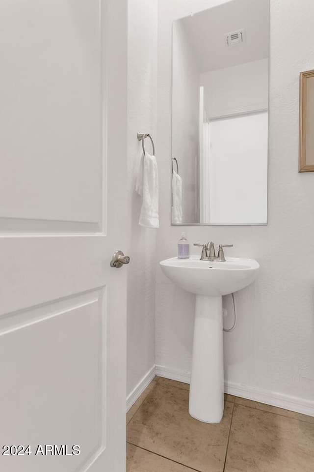 bathroom featuring sink and tile patterned floors