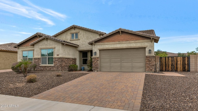 craftsman-style home featuring a garage