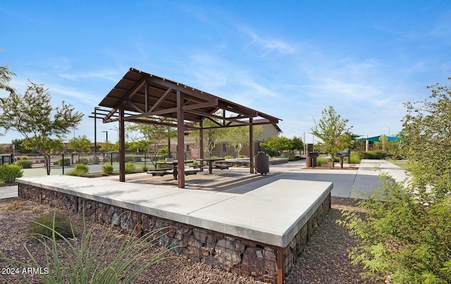 surrounding community with a gazebo and a patio