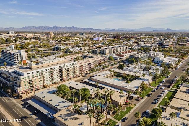 drone / aerial view featuring a mountain view