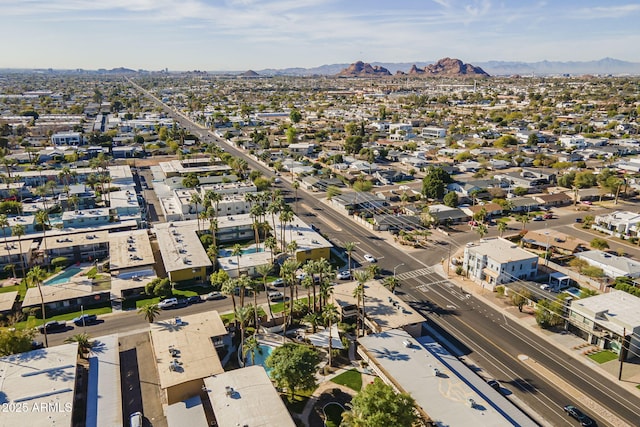 drone / aerial view featuring a mountain view