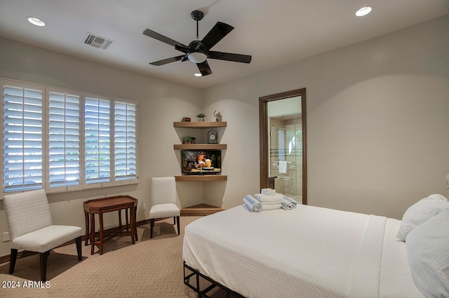 bedroom featuring ceiling fan and carpet