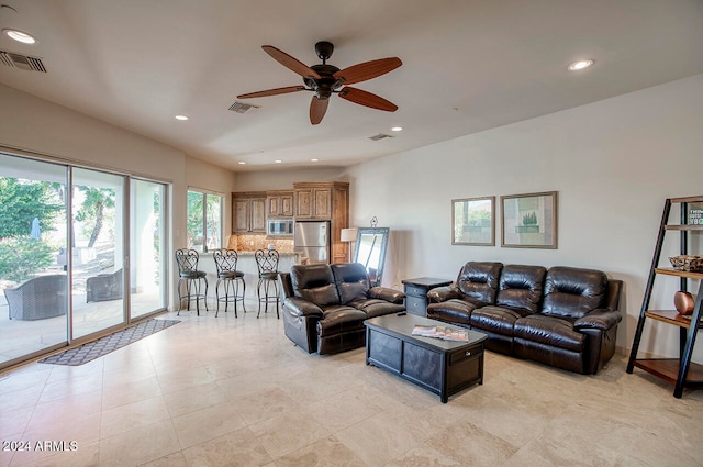 living room featuring ceiling fan