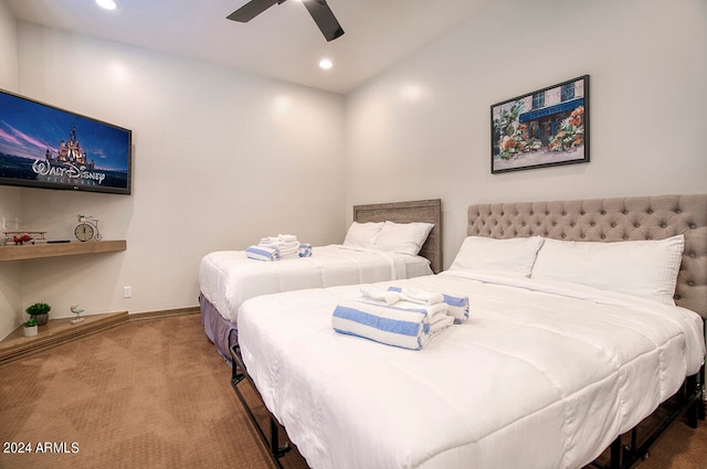 bedroom with ceiling fan and carpet floors