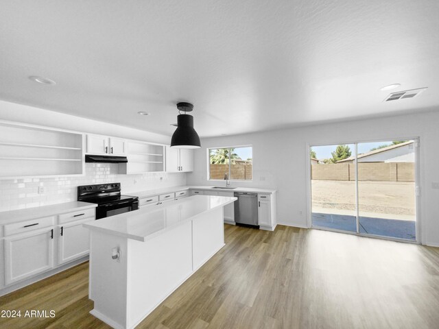 kitchen featuring electric range, dishwasher, white cabinets, and light wood-type flooring