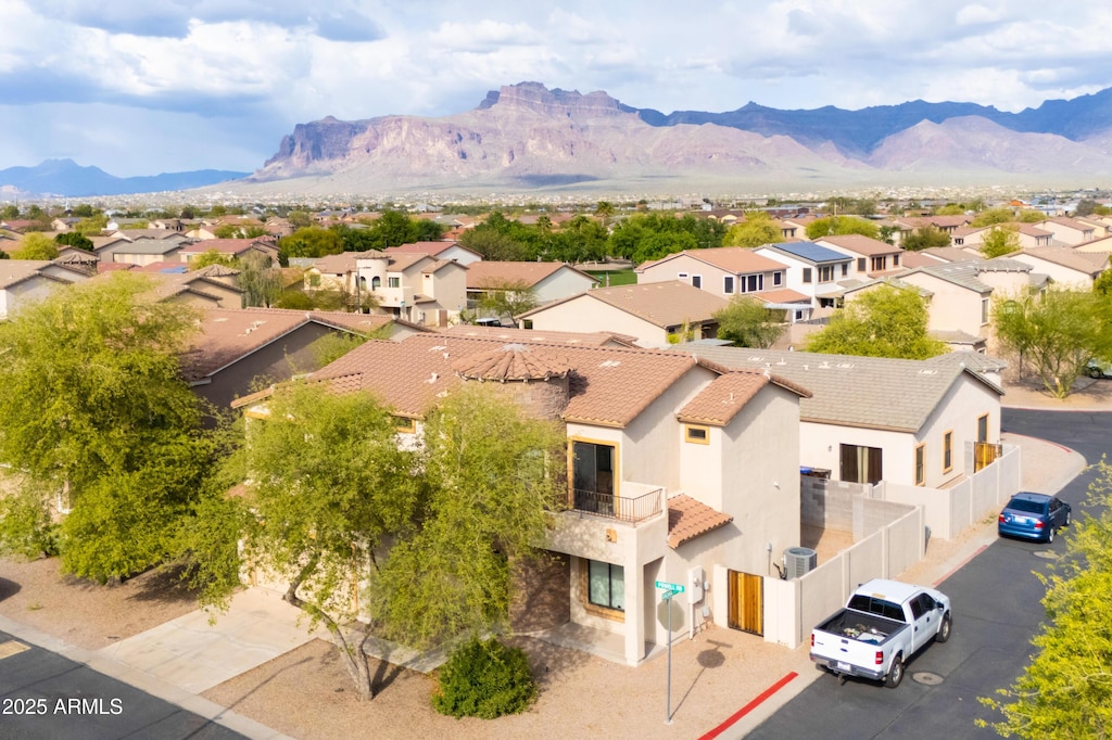 drone / aerial view featuring a mountain view and a residential view