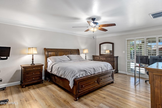 bedroom featuring visible vents, baseboards, light wood-style floors, access to outside, and ornamental molding