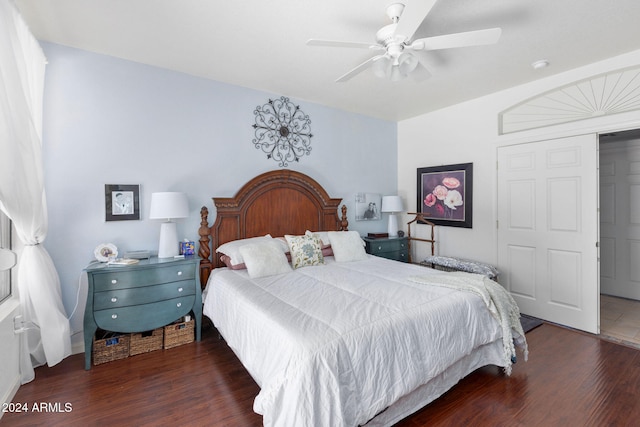 bedroom featuring ceiling fan and dark hardwood / wood-style flooring