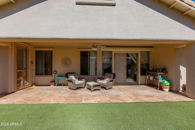 exterior space featuring ceiling fan