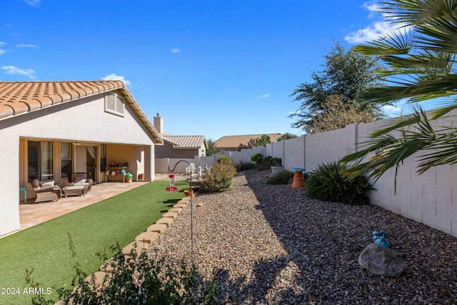 view of yard featuring a patio area