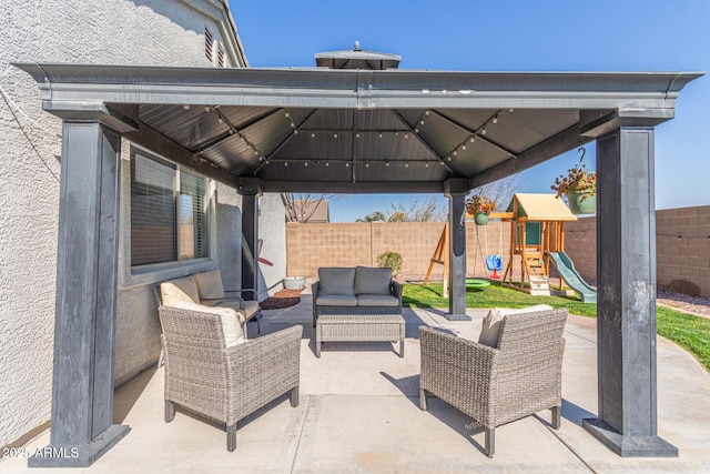 view of patio / terrace featuring a playground, a gazebo, and an outdoor hangout area