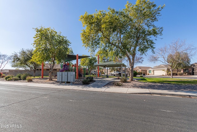 view of front of house featuring a gazebo and a playground