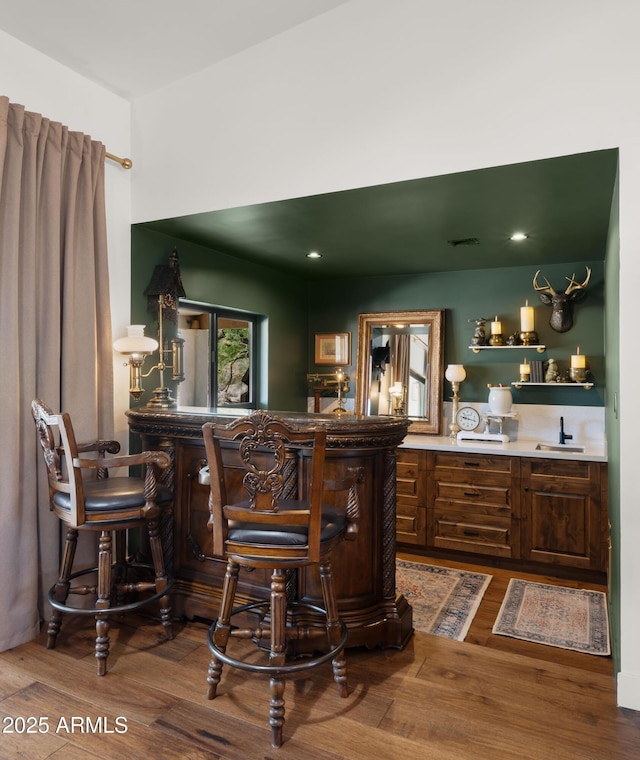 8049 E Serene St, Carefree, AZ 85377 - indoor wet bar with wood finished floors and recessed lighting