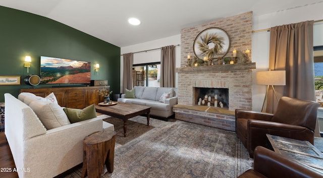 8049 E Serene St, Carefree, AZ 85377 - living room with vaulted ceiling, a fireplace, and wood finished floors