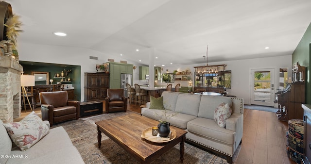 8049 E Serene St, Carefree, AZ 85377 - living area with lofted ceiling, wood-type flooring, a chandelier, and recessed lighting