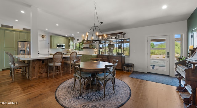 8049 E Serene St, Carefree, AZ 85377 - dining room with wood finished floors, recessed lighting, and a chandelier