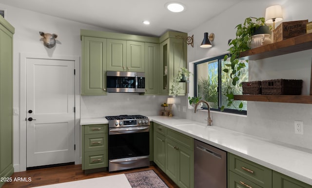 8049 E Serene St, Carefree, AZ 85377 - kitchen with green cabinets, open shelves, stainless steel appliances, dark wood-type flooring, and light countertops