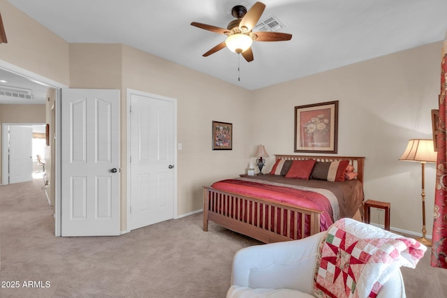 bedroom with light carpet and ceiling fan