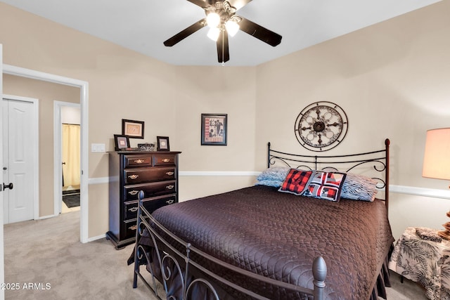 bedroom with ceiling fan and light carpet