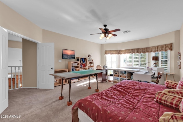 carpeted bedroom with ceiling fan