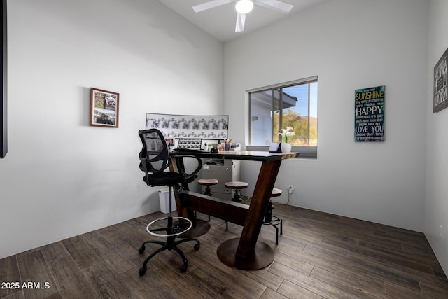 office area with a ceiling fan and wood finished floors