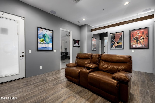 home theater featuring recessed lighting and wood finished floors