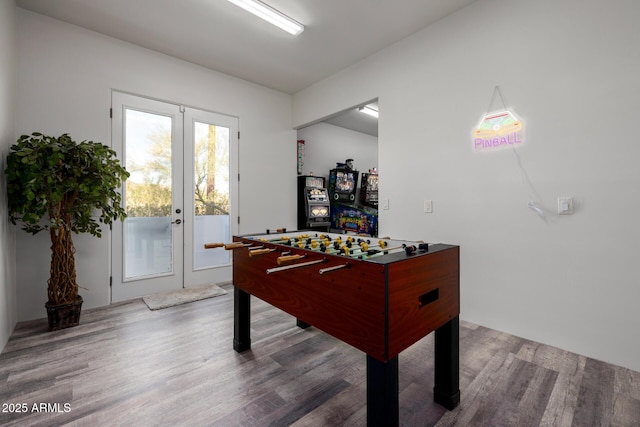 game room featuring wood finished floors and french doors