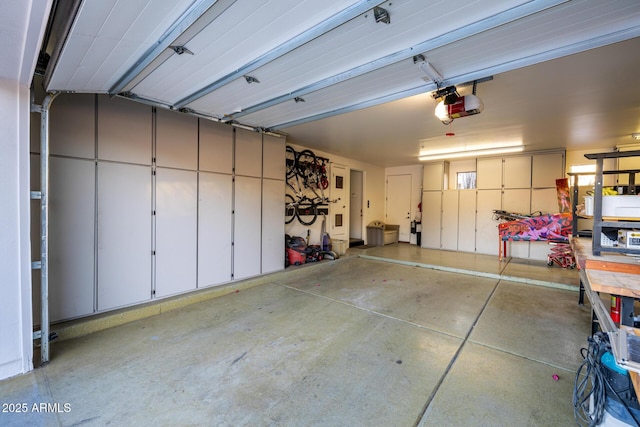 garage featuring a garage door opener