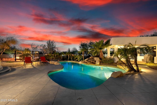 outdoor pool featuring a patio area