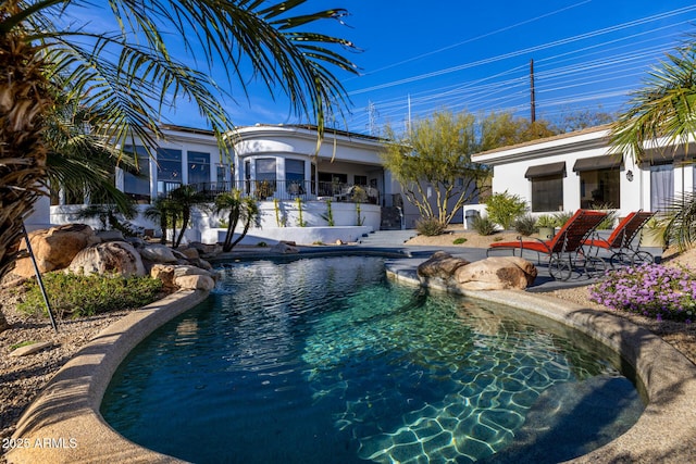 outdoor pool featuring a patio