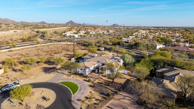 birds eye view of property with a residential view and a mountain view