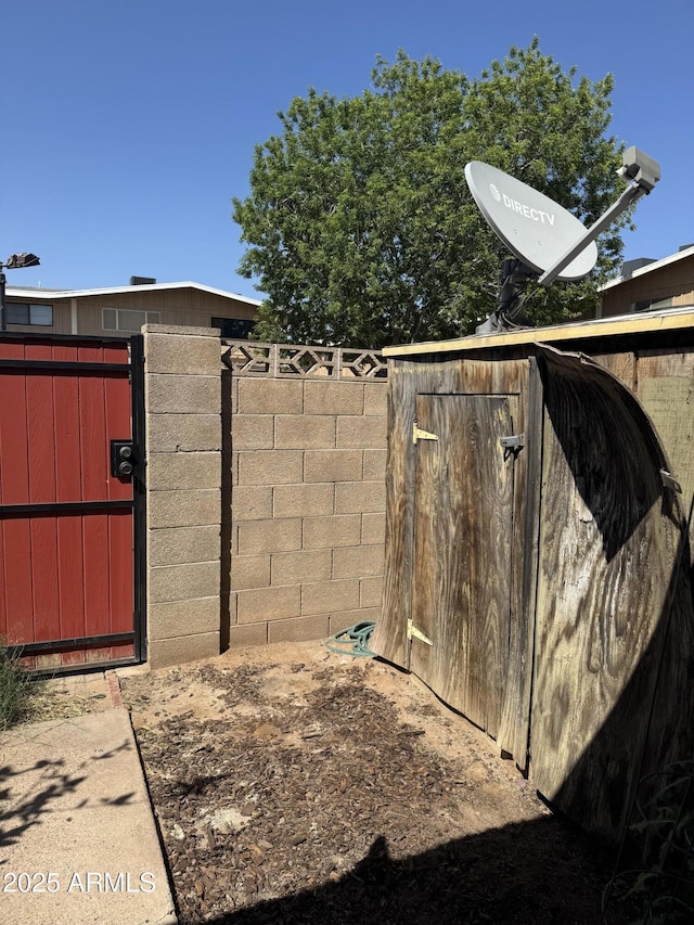 5363 N Black Canyon Highway, Phoenix, AZ 85015 - exterior space with an outbuilding, fence, and a storage shed