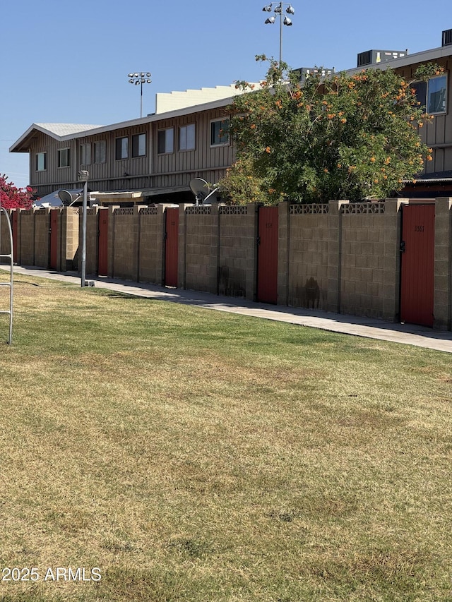 5363 N Black Canyon Highway, Phoenix, AZ 85015 - view of yard featuring fence and a gate
